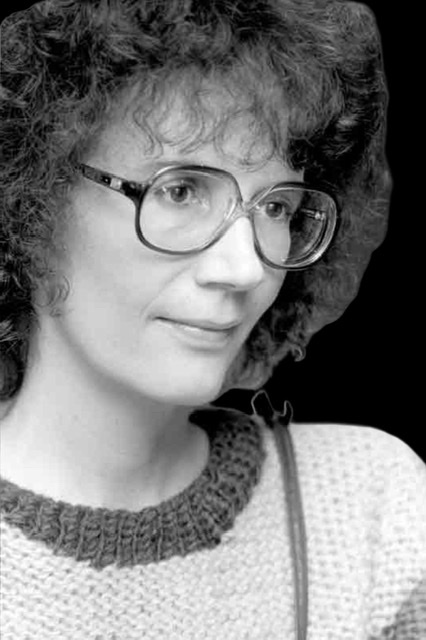 A photograph by Italian photographer Paolo Ferraresi (with his permission) of Joanne Brackeen as a younger woman with eyeglasses and frizzy hair looking to her right.