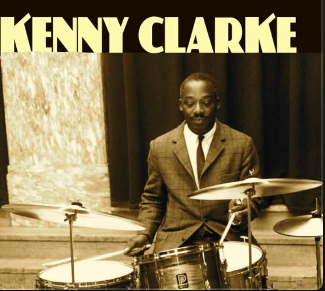 Drummer Kenny Clarke seated at drum kit from the album cover for "Inhibitions."