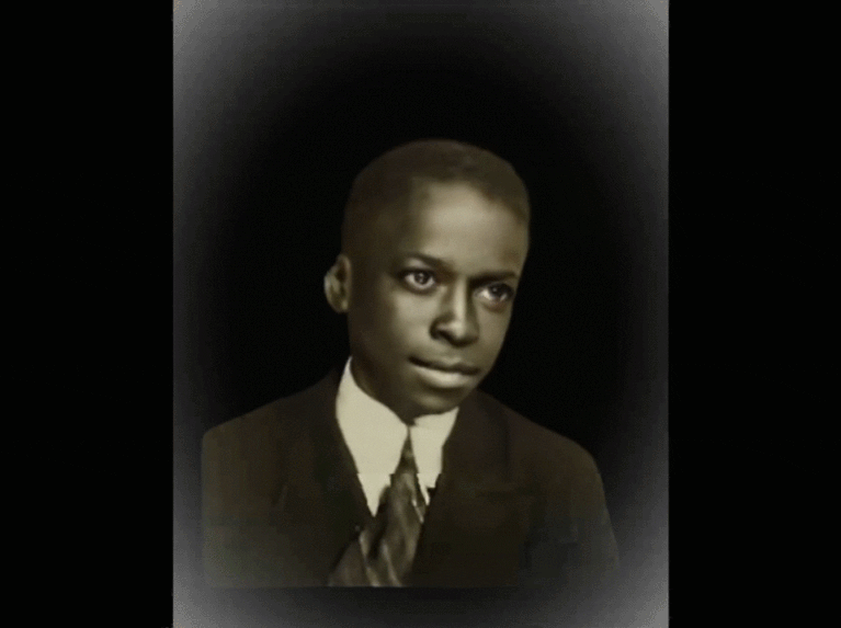 An animated black and white head of a teenage Miles Davis.
