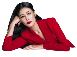 An enhanced photographic cutout of Jihye Lee wearing a red jacket with head resting on right hand at bent elbow and left arm resting on table (unseen).