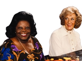 A color photograph of Mary Lou Williams and Marian McPartland sitting together on piano bench with big smiles.