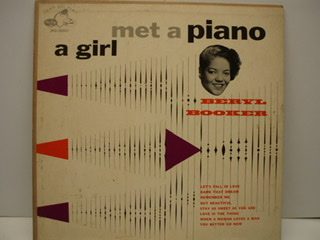 The album cover for Beryl Booker's album "A Girl Met A Piano."