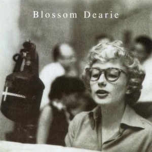 The album cover for the Verve Records debut album for "Blossom Dearie" (Verve 1957) with a picture of Dearie wearing glasses on the cover.