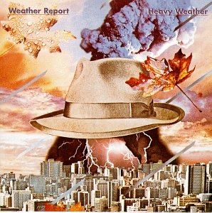 Weather Report's album cover for "Heavy Weather" with a picture of a gigantic hat with volcanic smoke spewing out of the top and a lightning storm out of the bottom over a major cities buildings.