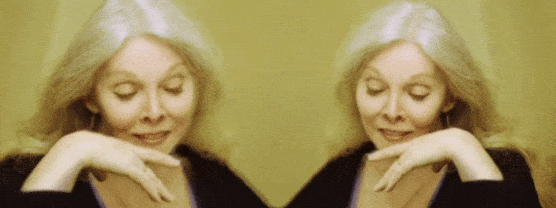 A slowly moving .gif of mirror images of color photographic cutouts of Jessica Williams with her bent right hand near her chin zooming towards and away from viewer.